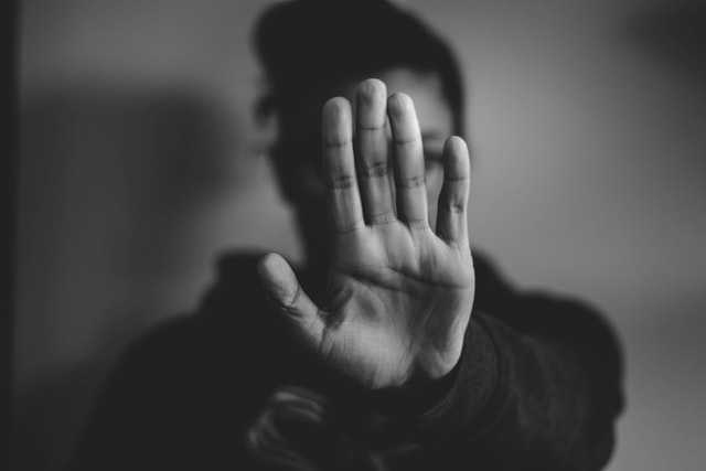 49 Branded Content Ideas 1 woman with hand up to stop