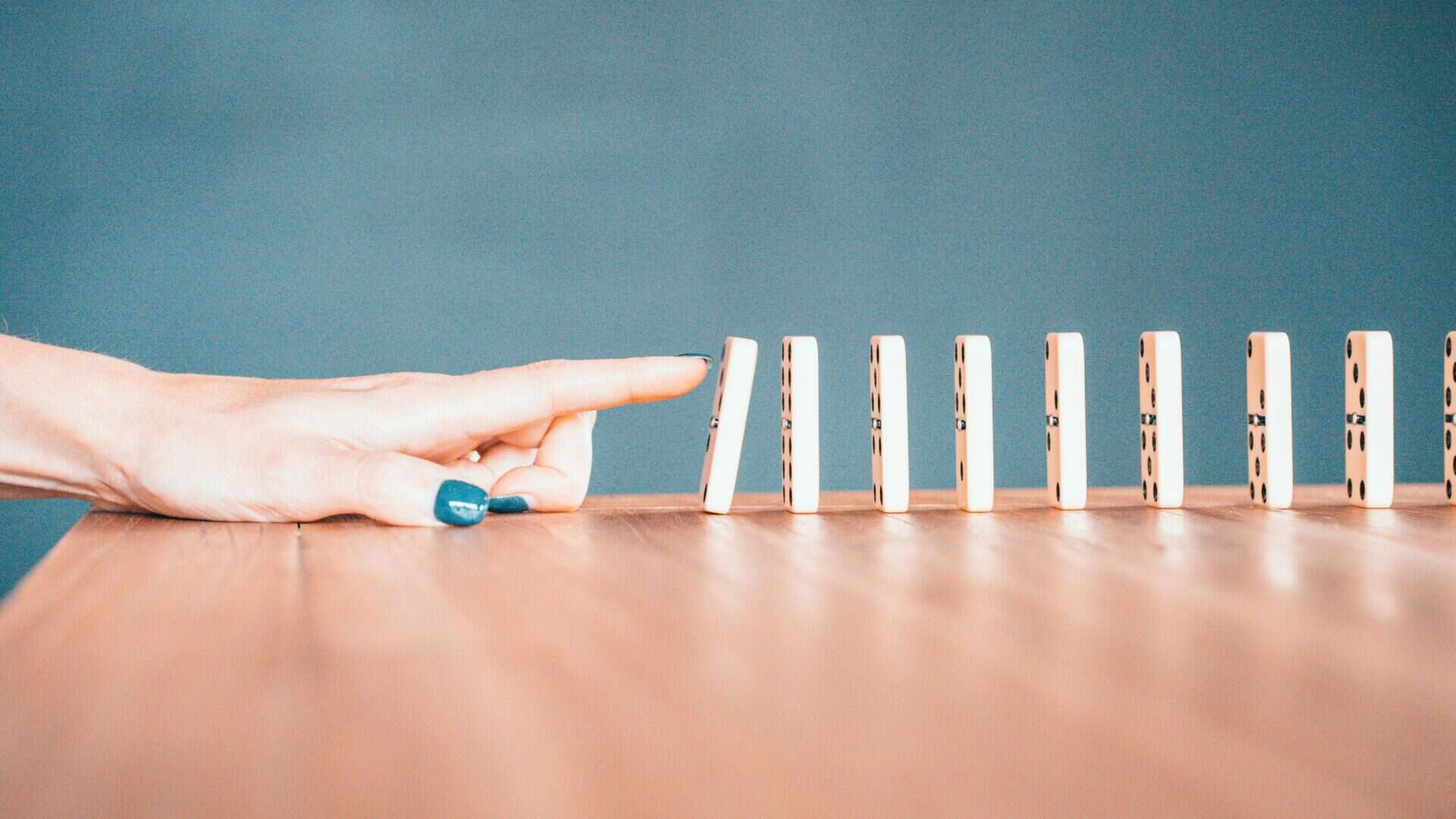 When Everything Breaks, Your Marketing System Shouldn’t 5 dominos - marketing system